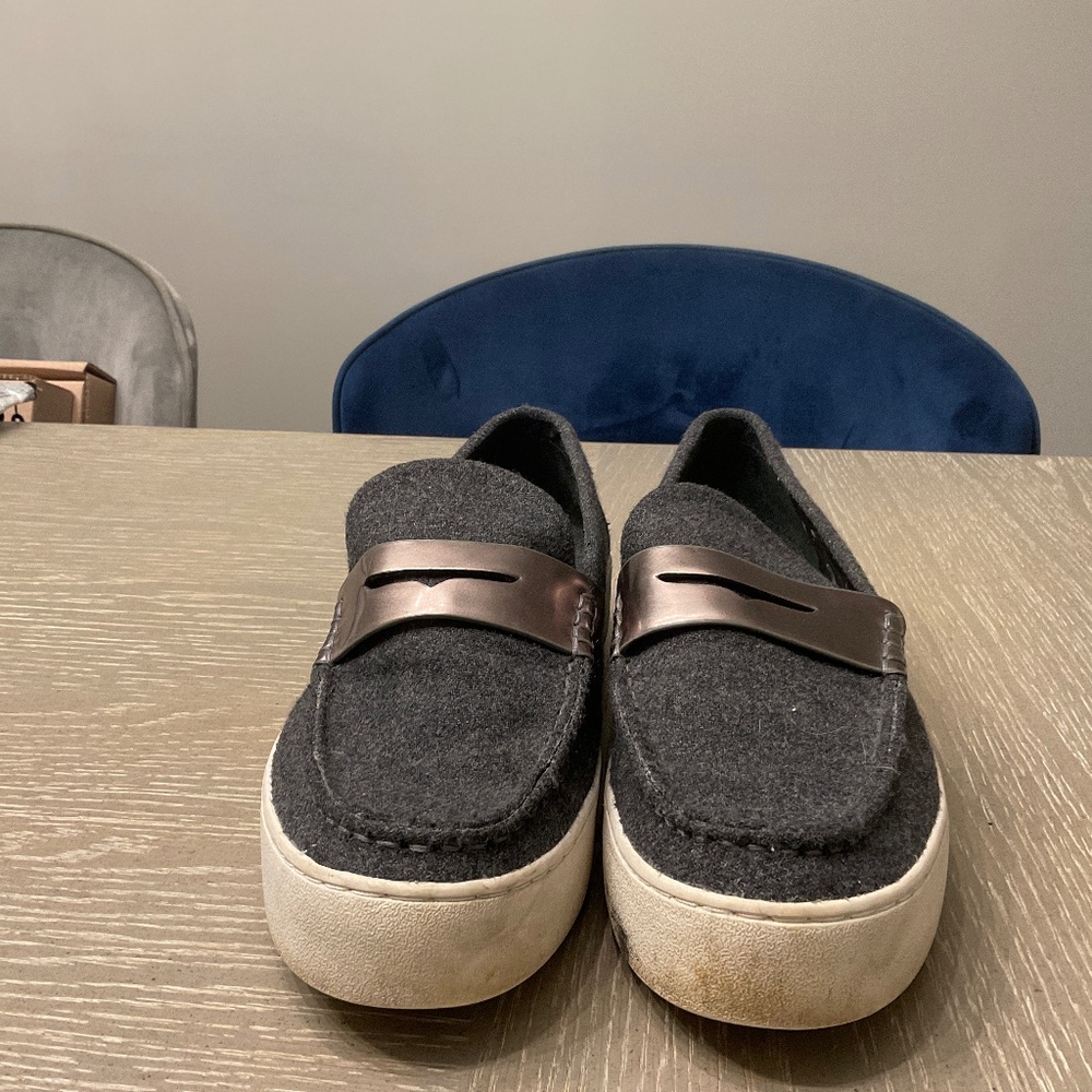 Grey felt penny loafer sneaker by Michael Michael Kors.
